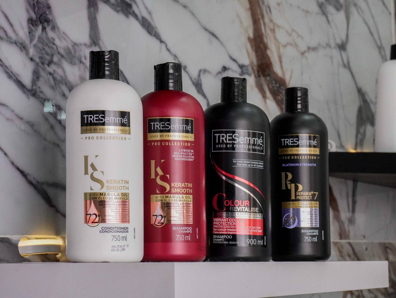 TRESemmé professional shampoo and conditioner range on a salon shelf